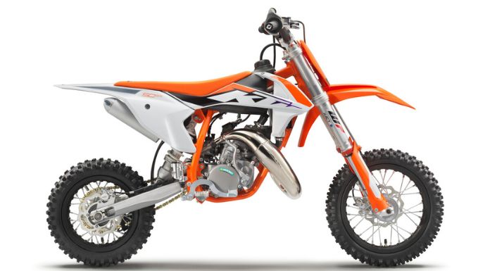 Isolated image of KTM 50 SX dirt bike facing right in white background