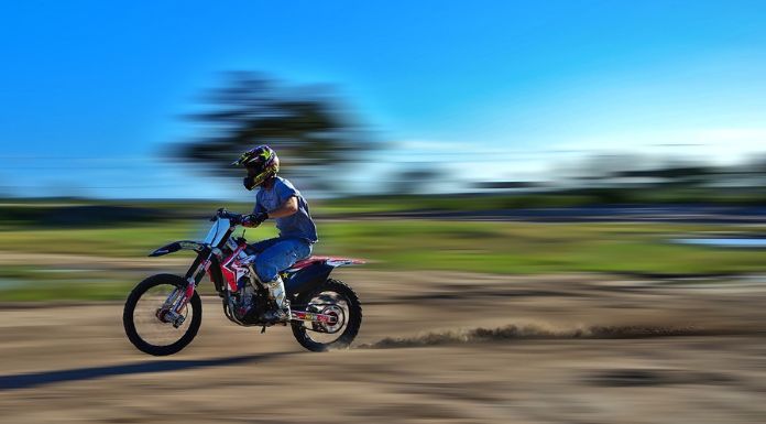 Man riding his dirt bike in fast speed