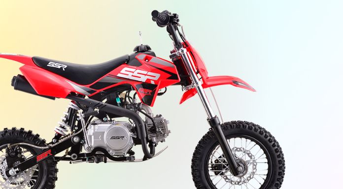 Side view image of ssr 110 dirt bike in light colorful background